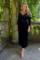 Claridges navy velvet dress with sleeves by Katya Wildman, an elegant occasion dress that covers your arms