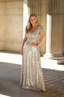 Soft silver sequin swing gown by Katya Wildman, a black tie evening gown