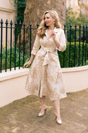cream brocade dress Rich cream and gold brocade crafted into a refined pencil silhouette. The peplums bring shape, drama, and couture-level sophistication Dress @praisecreations Brocade fabric @plushfabrics1